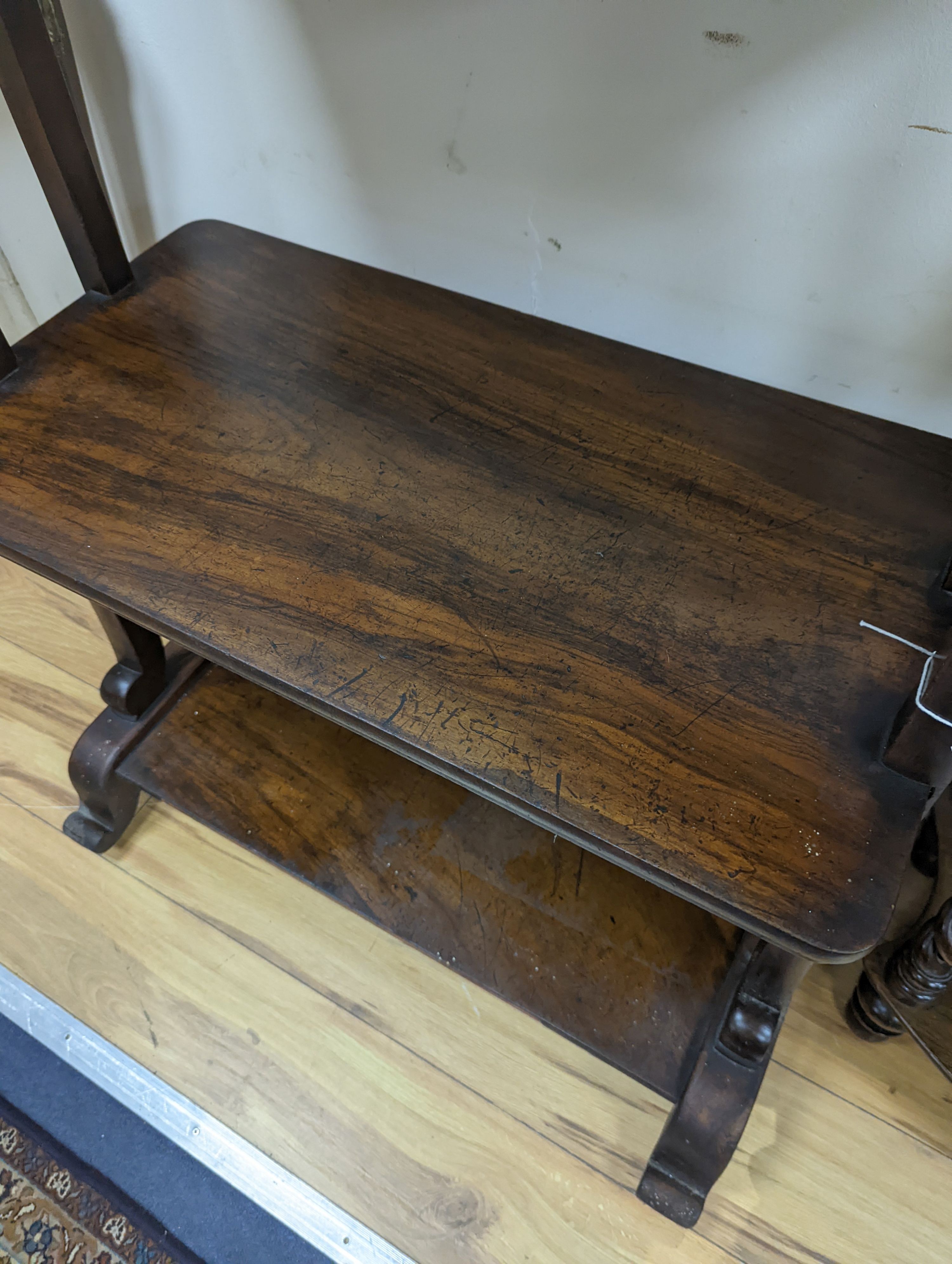 A Victorian rosewood three tier table. W-73cm, D-38cm, H-92cm.